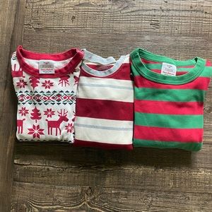 Three pair of Christmas pajamas in excellent used condition.🎄